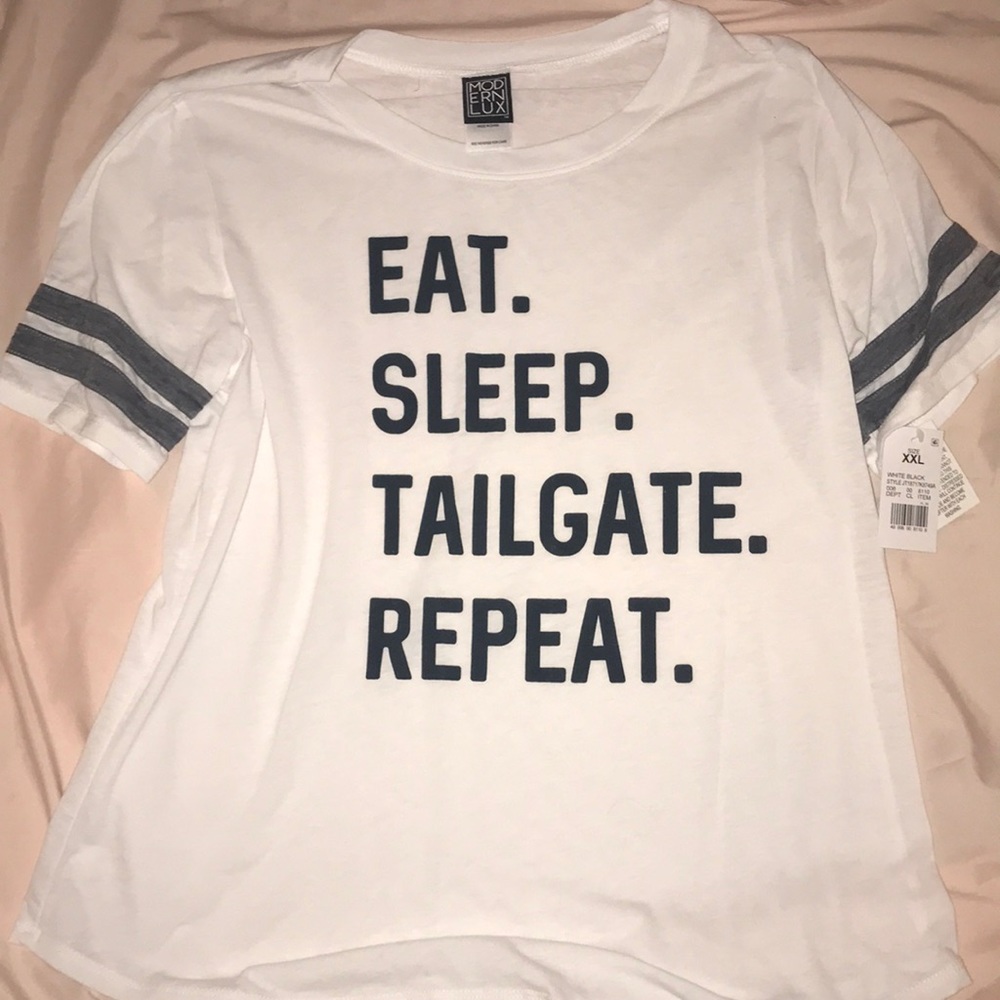 “Eat sleep tailgate repeat” graphic tee